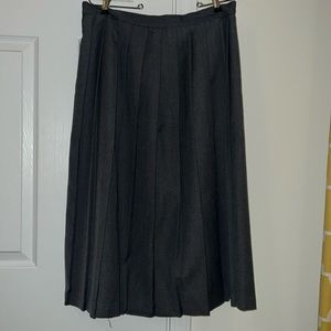 Pleated Gray skirt with buttons along back side. Made in USA.
